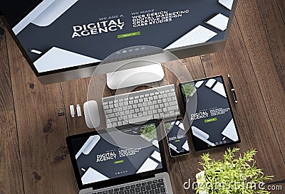 wooden desktop devices online digital agency responsive design Stock Photo