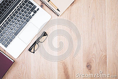 Wooden desktop with laptop Stock Photo