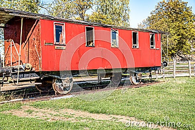 Wooden destroyed passenger train car Stock Photo