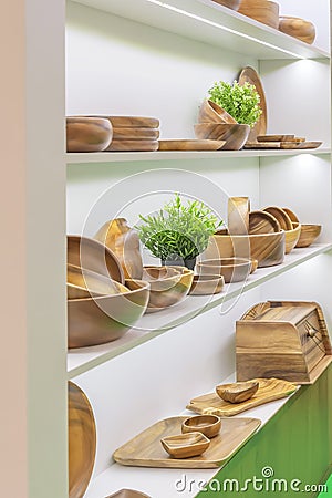 Wooden dishes. Kitchen utensils and accessories made of bamboo. Eco-friendly products. Various salad bowls, dishes, plates, food Stock Photo