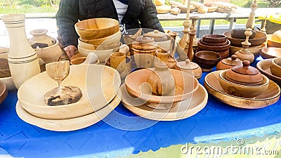 Wooden dishes. Traditionally hand-crafted dishes of indigenous wood pieces of exceptionally high quality exhibited at the fair Stock Photo