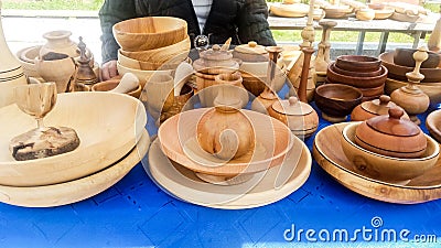 Wooden dishes. Traditionally hand-crafted dishes of indigenous wood pieces of exceptionally high quality exhibited at the fair Stock Photo