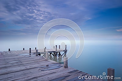 Wooden dock in blue morning Stock Photo