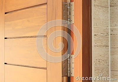 Wooden door with hinge Stock Photo