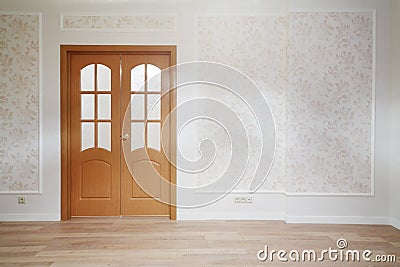 Wooden door in simple room with wooden floor Stock Photo