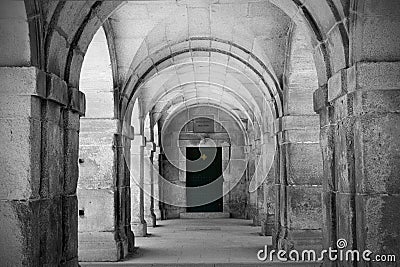 Wooden door and stone arches Stock Photo