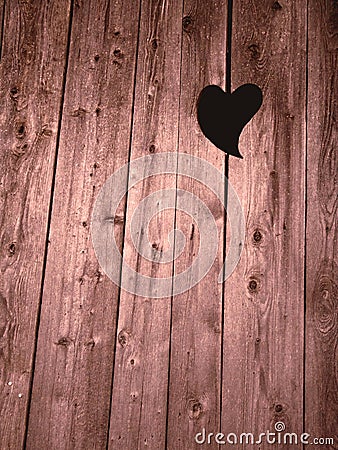 Wooden doors with heart hole - what a lovely pattern Stock Photo