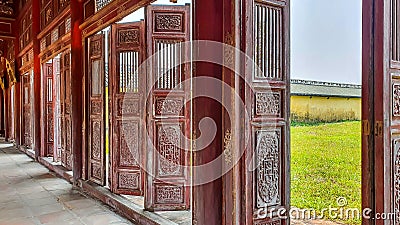 Wooden Doors At Long Corridor In Hue Imperial Citadel, Vietnam. Editorial Stock Photo