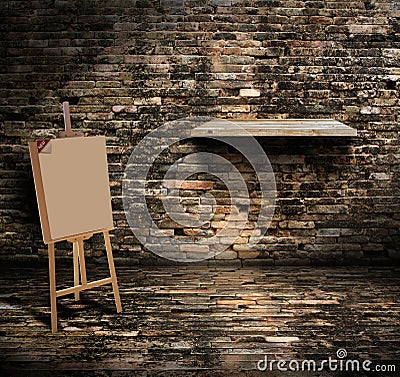 Wooden easel canvas stand with wood shelf Stock Photo