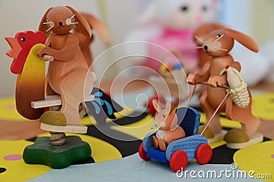 Wooden Easter Bunny Familiy With Baby In A Buggy Stock Photo