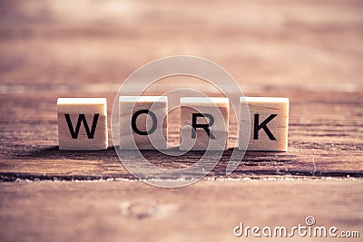 Wooden elements with word work Stock Photo