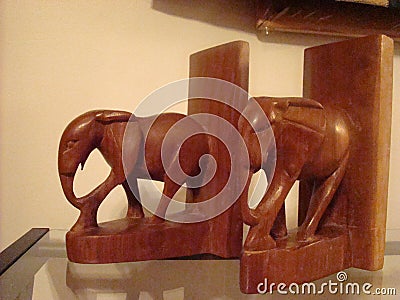 Wooden elephant bookends Stock Photo