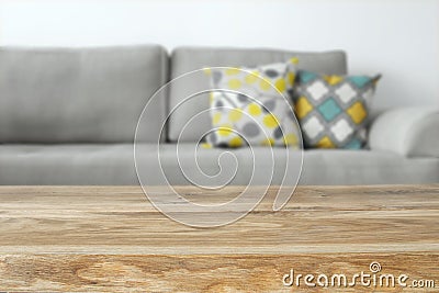 Wooden empty table in front of Living room sofa interior Stock Photo