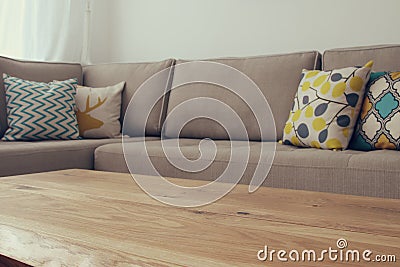 Wooden empty table in front of Living room sofa interior Stock Photo