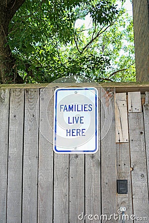 Families live here sign Stock Photo