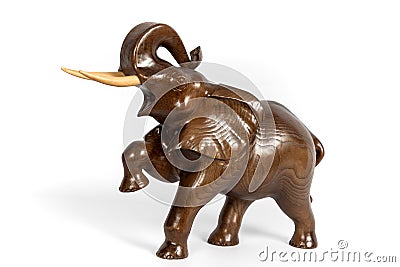 Wooden figure of a elephant isolated on background Stock Photo