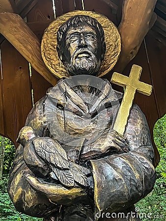 Wooden figure of Saint Francis of Assisi at the church in Kalety Miotek in Poland Editorial Stock Photo