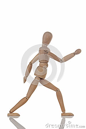 Wooden figure walking Stock Photo