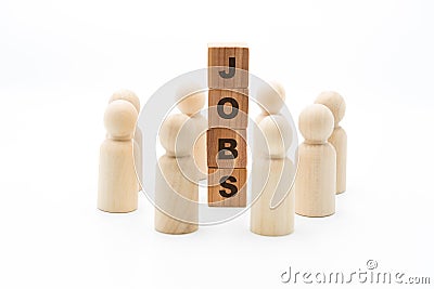 Wooden figures as business team in circle around word JOBS Stock Photo