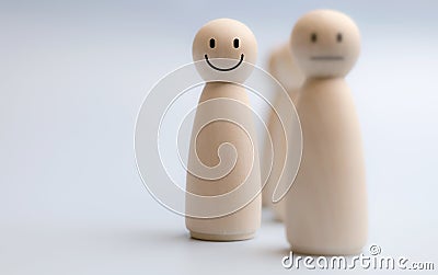 Wooden figures display happy contentment Stock Photo