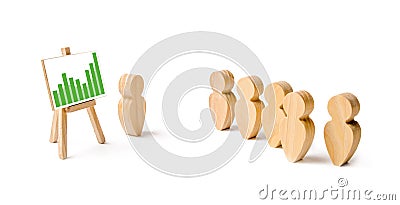 Wooden figures of people stand in the formation and listen to their leader. Business training, briefing and inspirational speech. Stock Photo