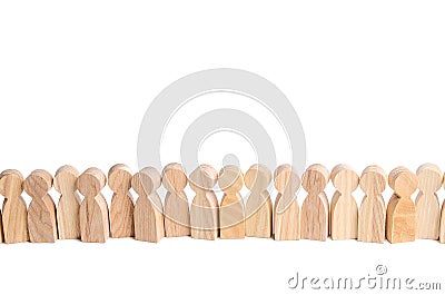 Wooden figures of people stand in a row. Waiting in line. Selection concept, choice. Search for new employees and workers, hiring Stock Photo