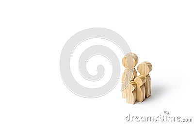 Wooden figurines of the family on a white background. Family values and health. Adoption and custody of children. Social support Stock Photo