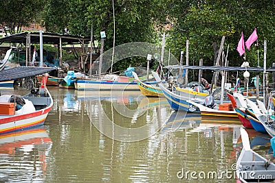 Wooden fish boat parking at the pier Editorial Stock Photo