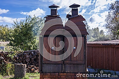 Wooden fish smoker in Poland Stock Photo