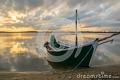 Wooden fishing boat in Garzon lagoon in Maldonado Editorial Stock Photo