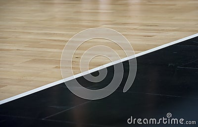 Wooden floor basketball arena. Wooden floor of sports hall with marking lines line on wooden floor indoor, gym court Stock Photo