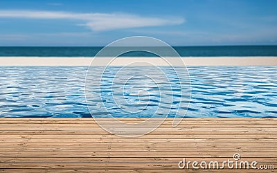 Wooden floor with infinity pool Stock Photo