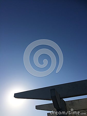 Wooden garden arch under the blue sky Stock Photo