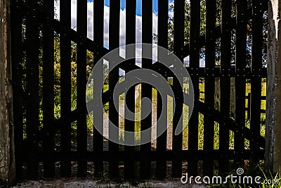 Wooden gate in the foreground and in the background the buc Stock Photo