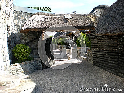 Wooden gate with a thatched roof Editorial Stock Photo