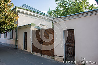 The wooden gates of the 18th century with two wickets in the old district of Podil in Kyiv Kiev, Ukraine Stock Photo