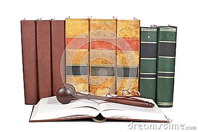 Wooden gavel and law books Stock Photo