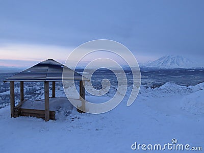 Wooden gazebo on the mountain on a winter day Stock Photo