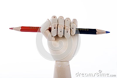 Wooden Hand Holding Pencil Stock Photo