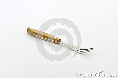 Wooden-handled three-pronged fork Stock Photo