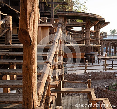 Wooden handrails and railings near the steps Stock Photo