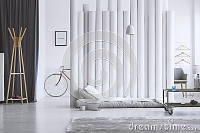 Wooden hanger in designer bedroom Stock Photo