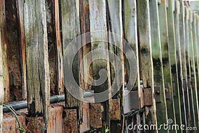 Wooden harbour wall repetition of lines pattern Stock Photo