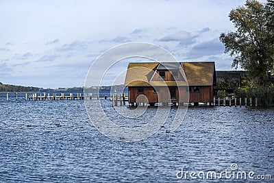 Wooden hause by tle lake in Schwerin in Germany Stock Photo