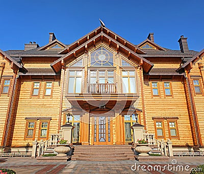 Wooden Honka club house in former private residence of ex-president Yanukovich Editorial Stock Photo