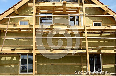 Wooden house exterior thermal insulation with mineral rockwool Stock Photo