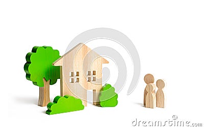 Wooden house and family. Buying a new home. Mortgage and loans. State program of assistance to young families. Subsidy. Quiet Stock Photo