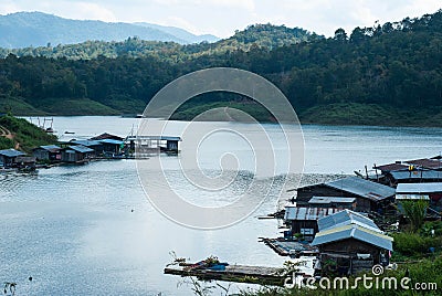 Wooden house on the river at Thailand Stock Photo
