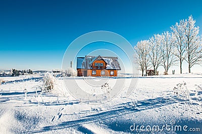 Wooden house in winter Stock Photo