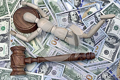 Wooden Human Figurine On The Sound Block And Cash Background Stock Photo
